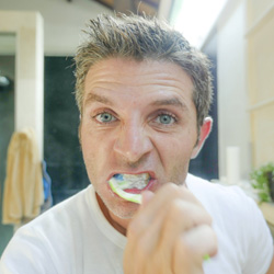 Man brushes teeth normally