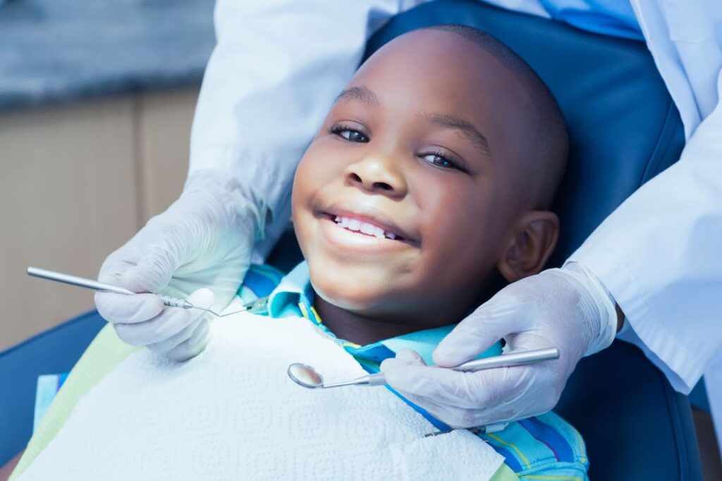 A child in a dental chair.